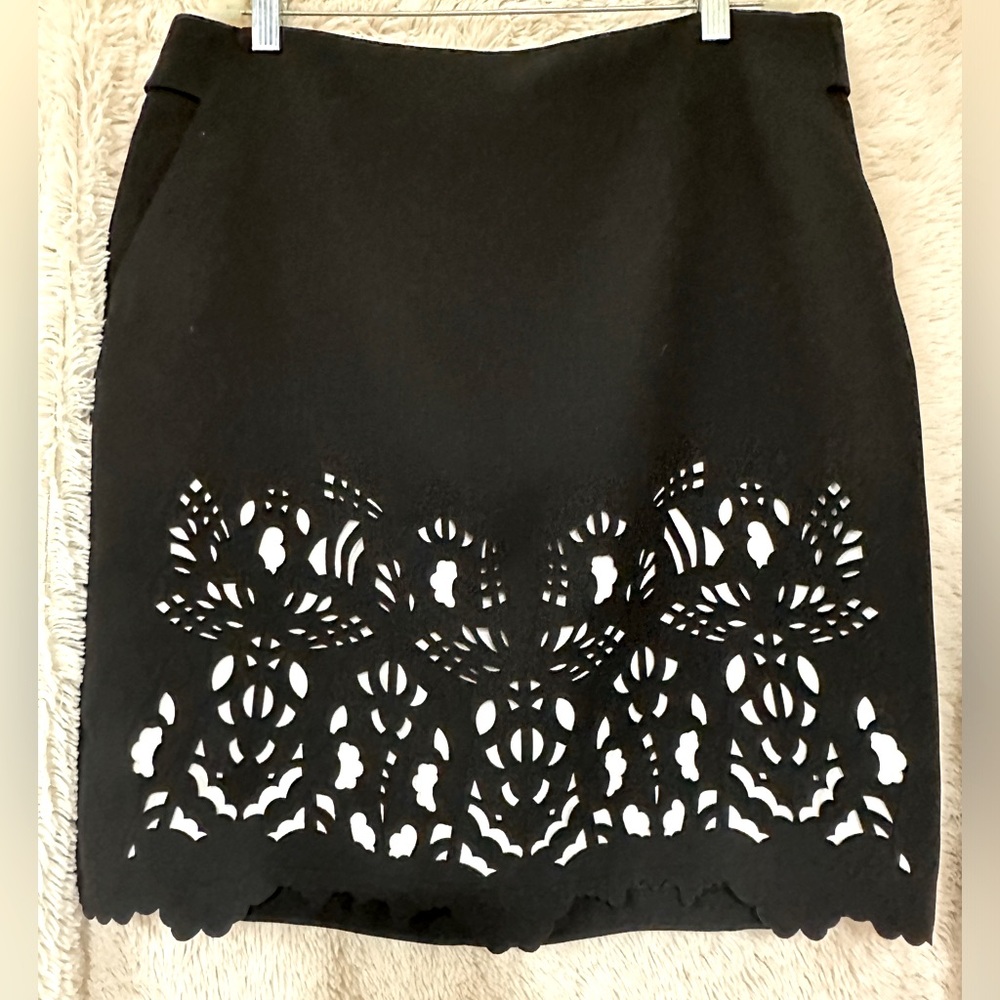 Black Skirt with Cutout Pattern over white lining